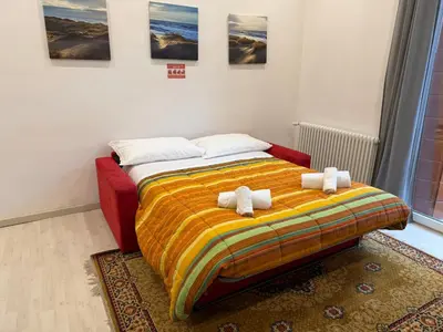 Letto o letti in una camera di Casa Milena