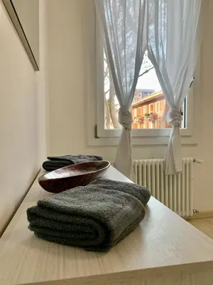 Letto o letti in una camera di Casa Milena