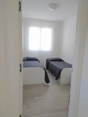 Letto o letti in una camera di Jesolo Appartamenti F2 - Coral Red