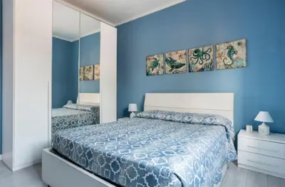 Letto o letti in una camera di Casa Davide