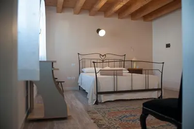Letto o letti in una camera di Al Giorgione