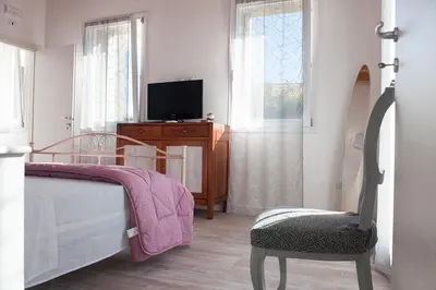 Letto o letti in una camera di Al Giorgione