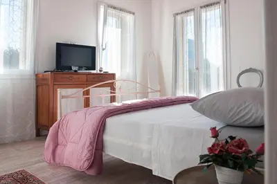 Letto o letti in una camera di Al Giorgione