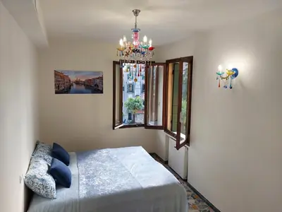 Letto o letti in una camera di Residenza Donini in Venice Suite 2