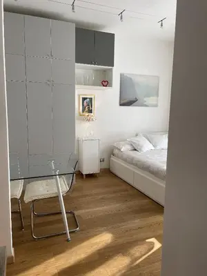 Letto o letti in una camera di A UN PASSO DALL'OSPEDALE