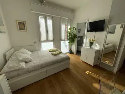 Letto o letti in una camera di A UN PASSO DALL'OSPEDALE