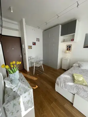 Letto o letti in una camera di A UN PASSO DALL'OSPEDALE