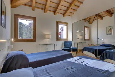 Letto o letti in una camera di TORRE-BARBARIGA country house,3 beds,3 bath,parking