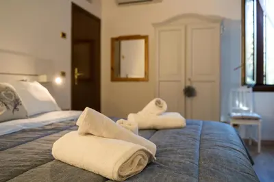 Letto o letti in una camera di All’Altana b&b apartment