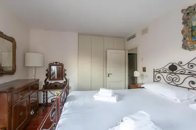 Letto o letti in una camera di Ca' al Giglio - Appartamento Vista Canale
