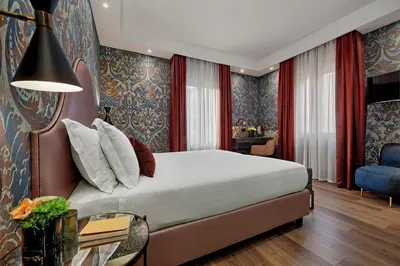 Letto o letti in una camera di Hotel American-Dinesen