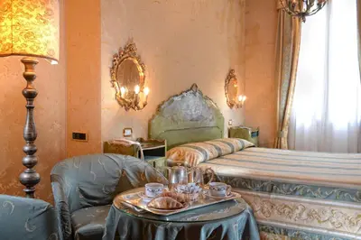Letto o letti in una camera di Hotel Concordia