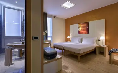 Letto o letti in una camera di Best Western Plus Hotel Bologna