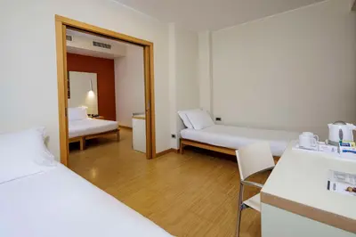 Letto o letti in una camera di Best Western Plus Hotel Bologna