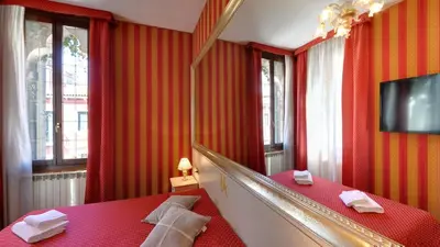 Letto o letti in una camera di Hotel Messner