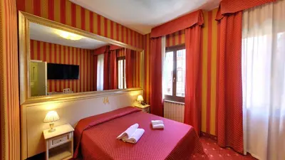 Letto o letti in una camera di Hotel Messner