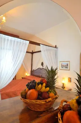 Letto o letti in una camera di Villa Albertina