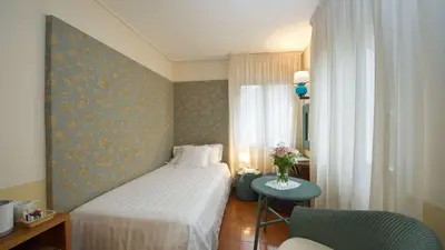 Letto o letti in una camera di Hotel Villa Mabapa