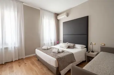 Letto o letti in una camera di Locanda Herion