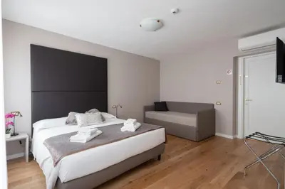 Letto o letti in una camera di Locanda Herion