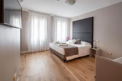 Letto o letti in una camera di Locanda Herion