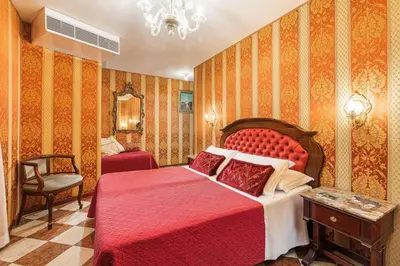 Letto o letti in una camera di Hotel Marconi