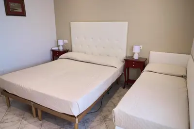 Letto o letti in una camera di Hotel Viña del Mar Pineta