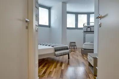 Letto o letti in una camera di Marconi House