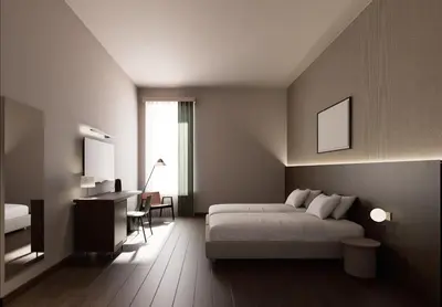 Letto o letti in una camera di BYPILLOW Grand Central