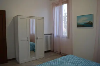 Letto o letti in una camera di Noemi Venice Home