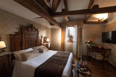 Letto o letti in una camera di Palazzo Bembo - Exclusive Accommodation
