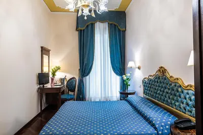 Letto o letti in una camera di Locanda Sant'Agostin