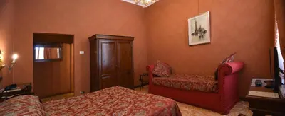 Letto o letti in una camera di Hotel Ateneo