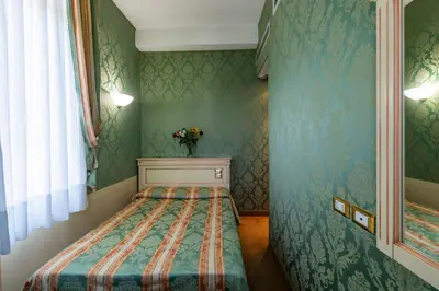 Letto o letti in una camera di Hotel Villa Delle Palme