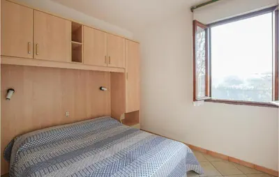 Letto o letti in una camera di Eden 2