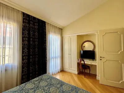 TV o dispositivi per l'intrattenimento presso Torre Dell'Orologio Signature Residence