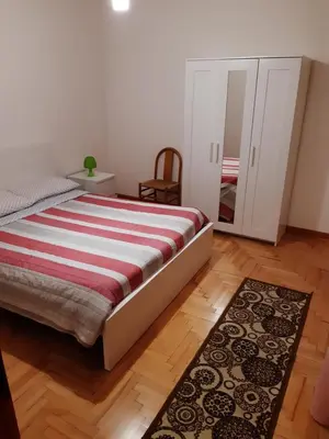 Letto o letti in una camera di Miniappartamento Singolo