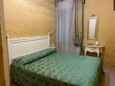 Letto o letti in una camera di Hotel Bridge