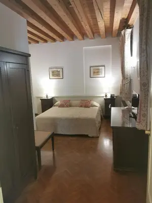 Letto o letti in una camera di Hotel Riviera dei Dogi