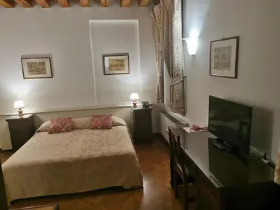 Letto o letti in una camera di Hotel Riviera dei Dogi