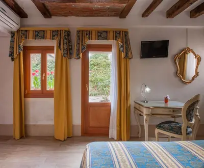 TV o dispositivi per l'intrattenimento presso Hotel Il Mercante di Venezia