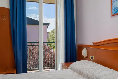 Letto o letti in una camera di Hotel Palladio