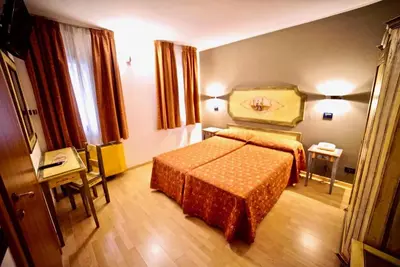 Letto o letti in una camera di Hotel Centrale
