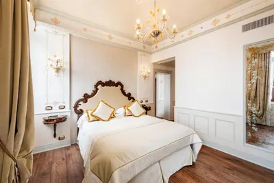 Letto o letti in una camera di Monaco & Grand Canal