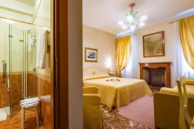 Letto o letti in una camera di Hotel Mercurio