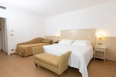 Letto o letti in una camera di Hotel Universal Terme