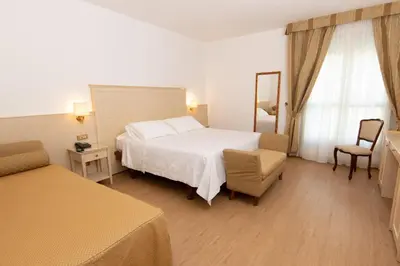 Letto o letti in una camera di Hotel Universal Terme