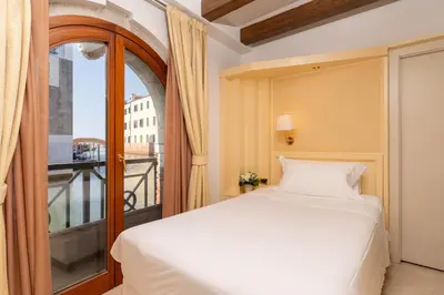 Letto o letti in una camera di Hotel Giudecca Venezia