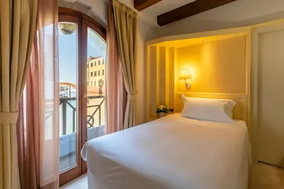 Letto o letti in una camera di Hotel Giudecca Venezia