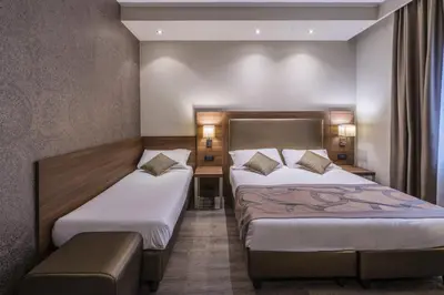 Letto o letti in una camera di Smart Hotel Holiday